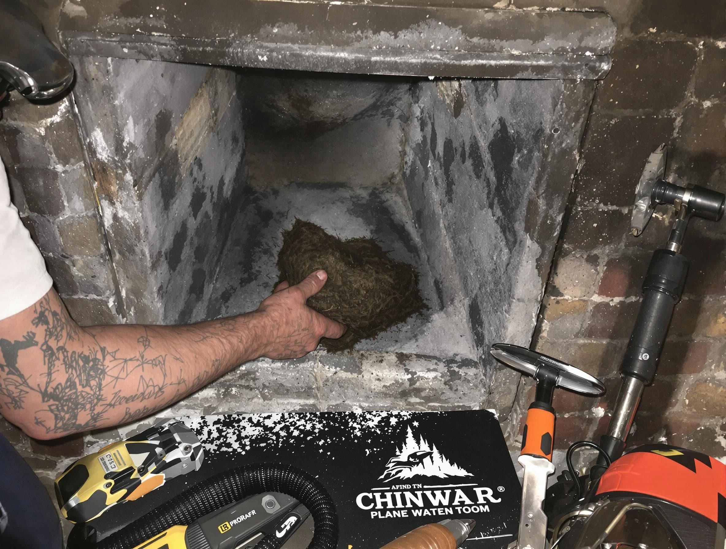 Morris Chimney Sweep safely removing debris and screening chimney in Morris, NJ